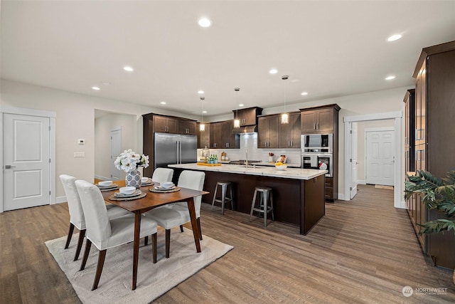 dining room featuring dark hardwood / wood-style flooring