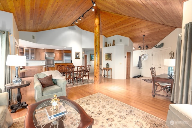 living room with track lighting, wood ceiling, an inviting chandelier, and light hardwood / wood-style flooring