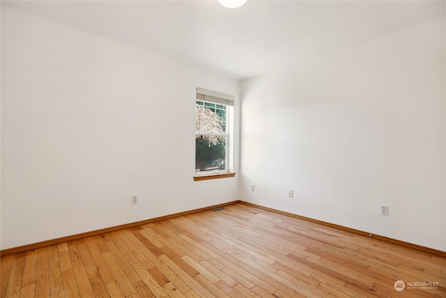 empty room featuring light wood-type flooring