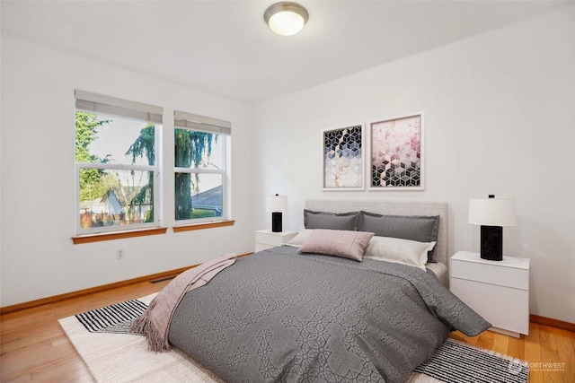 bedroom featuring light wood-type flooring