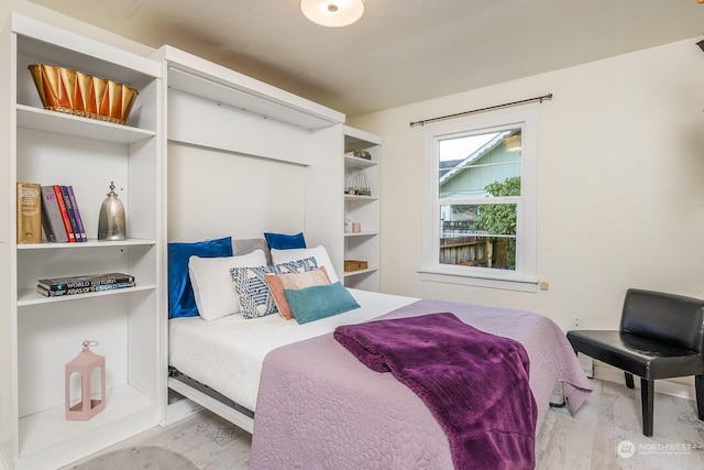 bedroom featuring light wood-type flooring