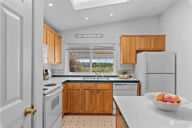 kitchen with decorative backsplash, white appliances, sink, and vaulted ceiling