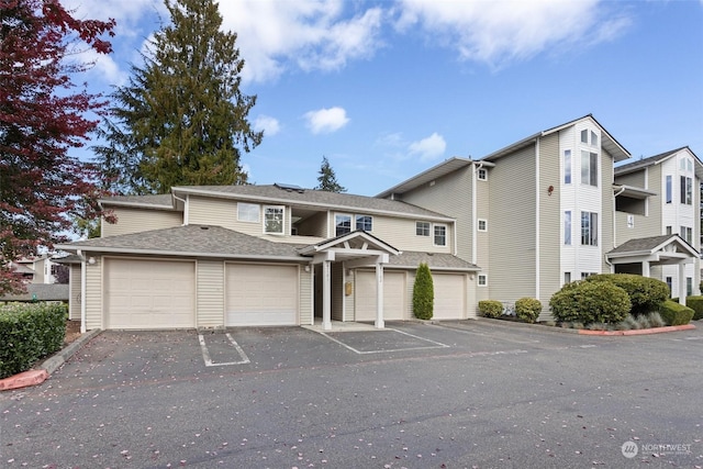 front of property with a garage