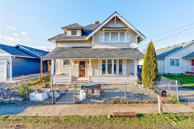 view of front of property featuring covered porch