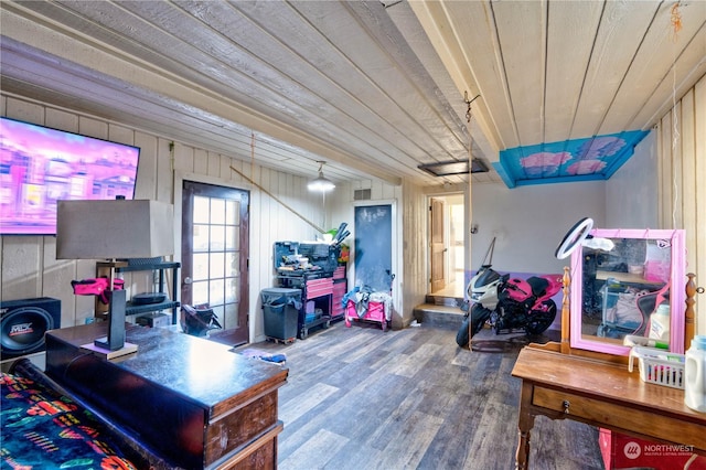 office space with wood ceiling, wood walls, and wood-type flooring