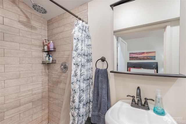 bathroom featuring sink and walk in shower