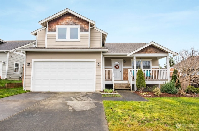 view of front facade with a garage, covered porch, and a front lawn