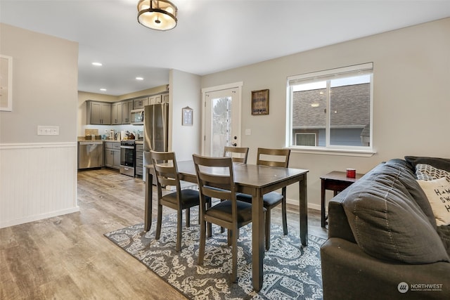 dining area with light wood-type flooring