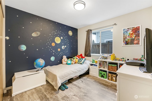 bedroom featuring light wood-type flooring