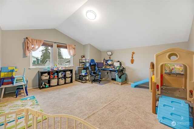 game room with carpet and vaulted ceiling