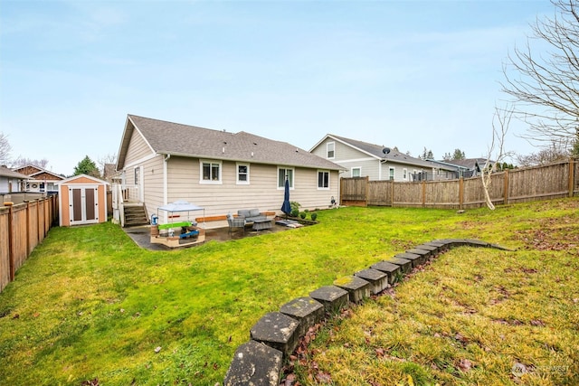 rear view of property featuring a patio, a shed, and a lawn