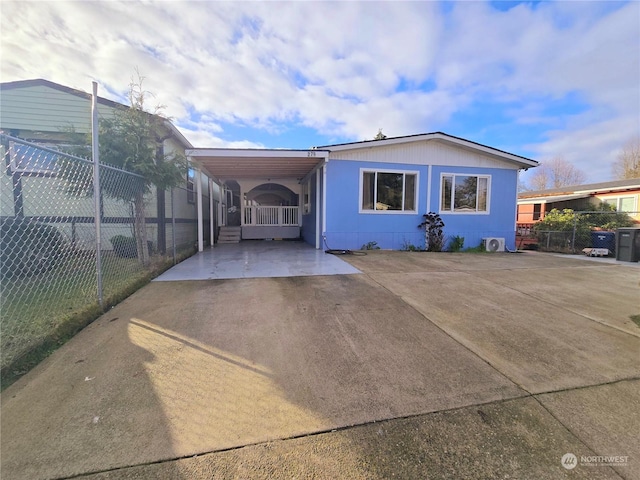 view of front facade with a carport