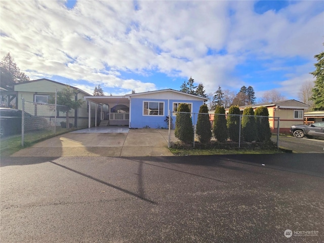 view of front of house featuring a carport