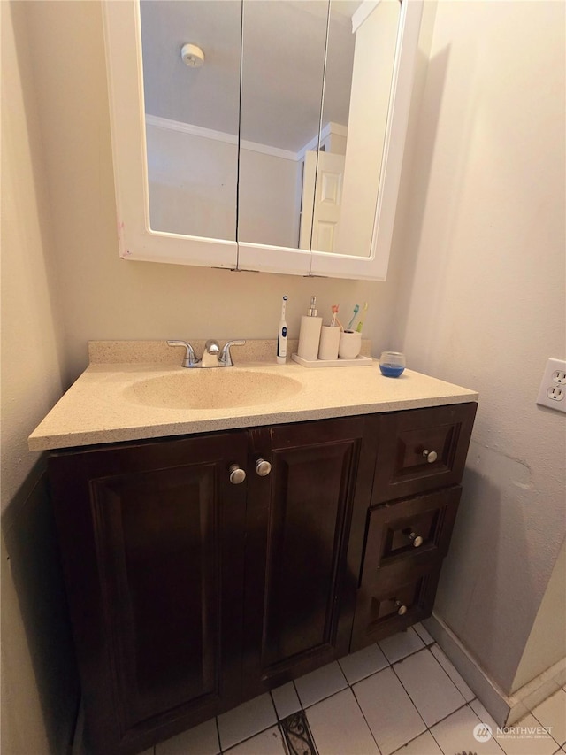 bathroom featuring tile patterned floors and vanity