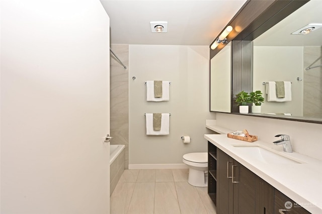 full bathroom featuring vanity, tiled shower / bath combo, and toilet