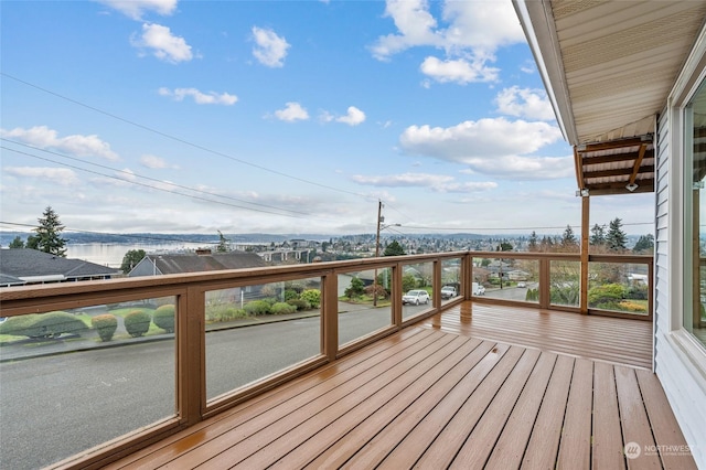 wooden deck with a water view