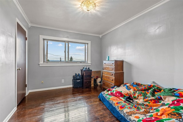 bedroom featuring dark hardwood / wood-style floors and crown molding