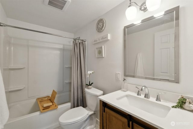 full bathroom with toilet, vanity, and shower / bath combo