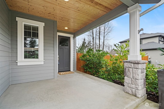 entrance to property featuring a patio area