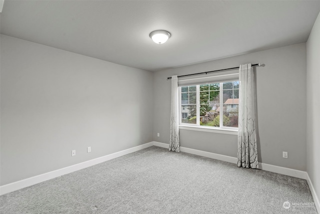 view of carpeted spare room