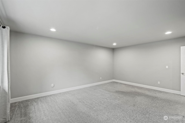 empty room featuring carpet floors