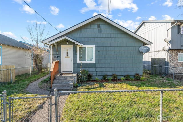 bungalow with a front lawn