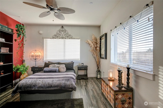 bedroom with ceiling fan and hardwood / wood-style floors