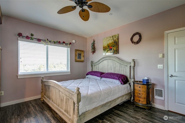 bedroom featuring ceiling fan and dark hardwood / wood-style floors