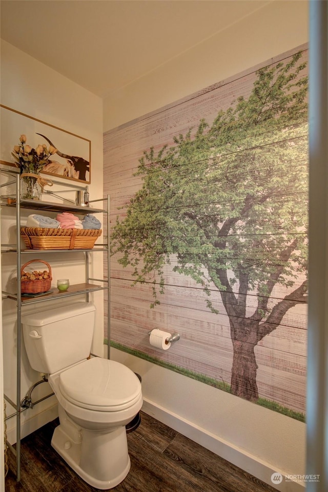 bathroom featuring toilet and hardwood / wood-style floors