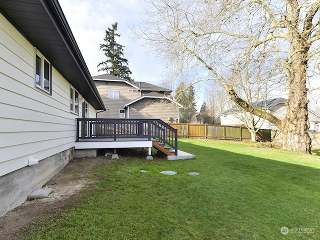 view of yard featuring a wooden deck