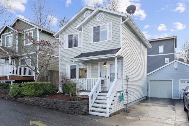 view of front of house featuring a porch and a garage