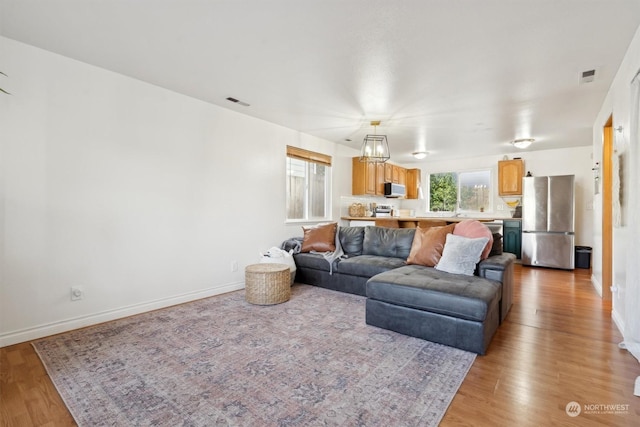 living room featuring light wood-type flooring