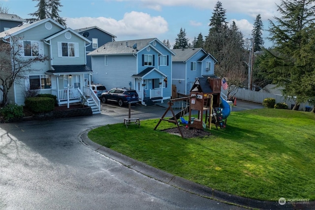 view of jungle gym featuring a yard