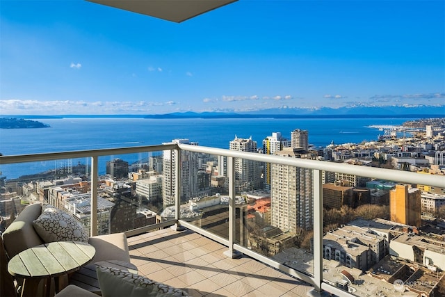 balcony featuring a water view