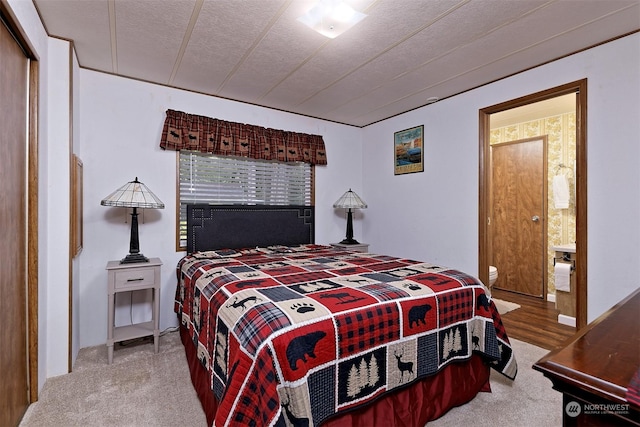 bedroom with light carpet