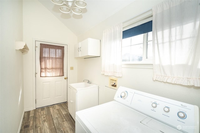 laundry area with sink, independent washer and dryer, cabinets, and dark hardwood / wood-style floors