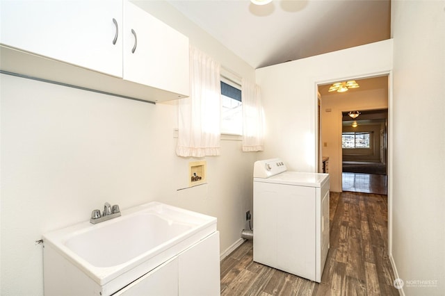 laundry area featuring dark hardwood / wood-style floors, washer / dryer, cabinets, ceiling fan, and sink