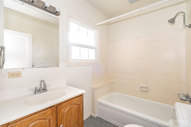 bathroom featuring vanity and shower / bath combination