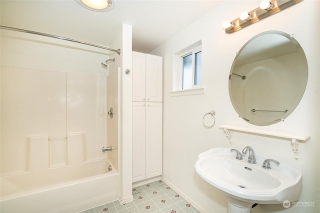 bathroom featuring sink, tile patterned flooring, and shower / bathing tub combination