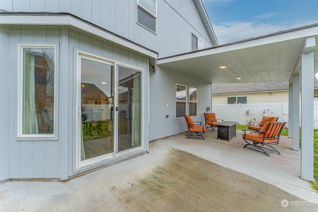 view of patio / terrace featuring an outdoor fire pit