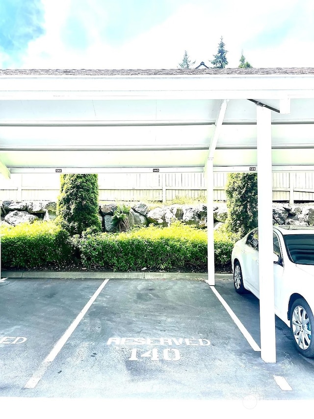 view of parking with a carport