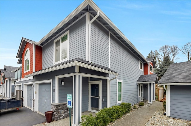 view of front of home with a garage