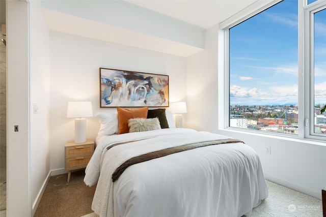 bedroom featuring carpet