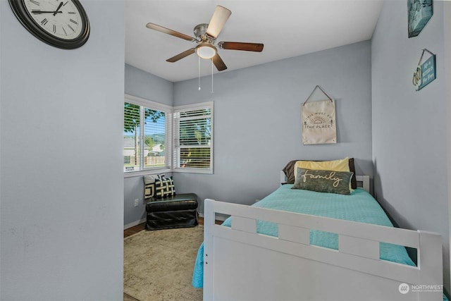 bedroom featuring ceiling fan