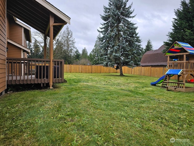 view of yard featuring a wooden deck