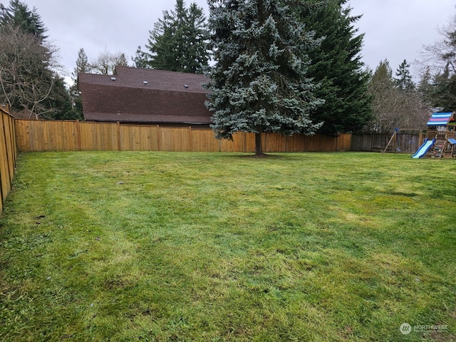 view of yard with a playground