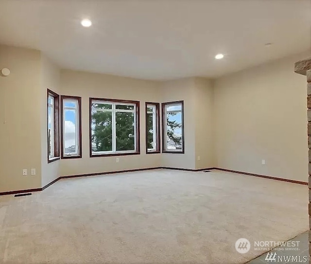 view of carpeted spare room