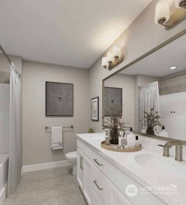 full bathroom with toilet, vanity, and shower / bath combo