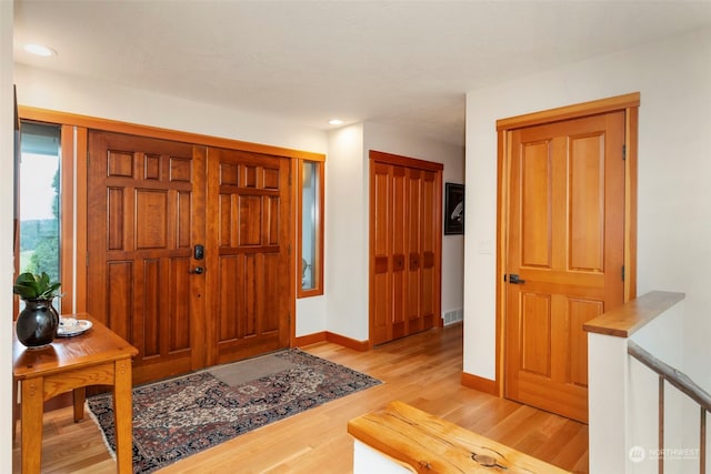 entrance foyer featuring light hardwood / wood-style flooring