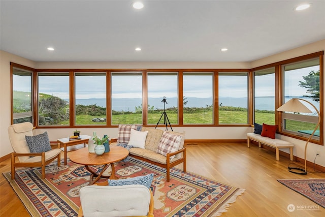 sunroom / solarium featuring plenty of natural light